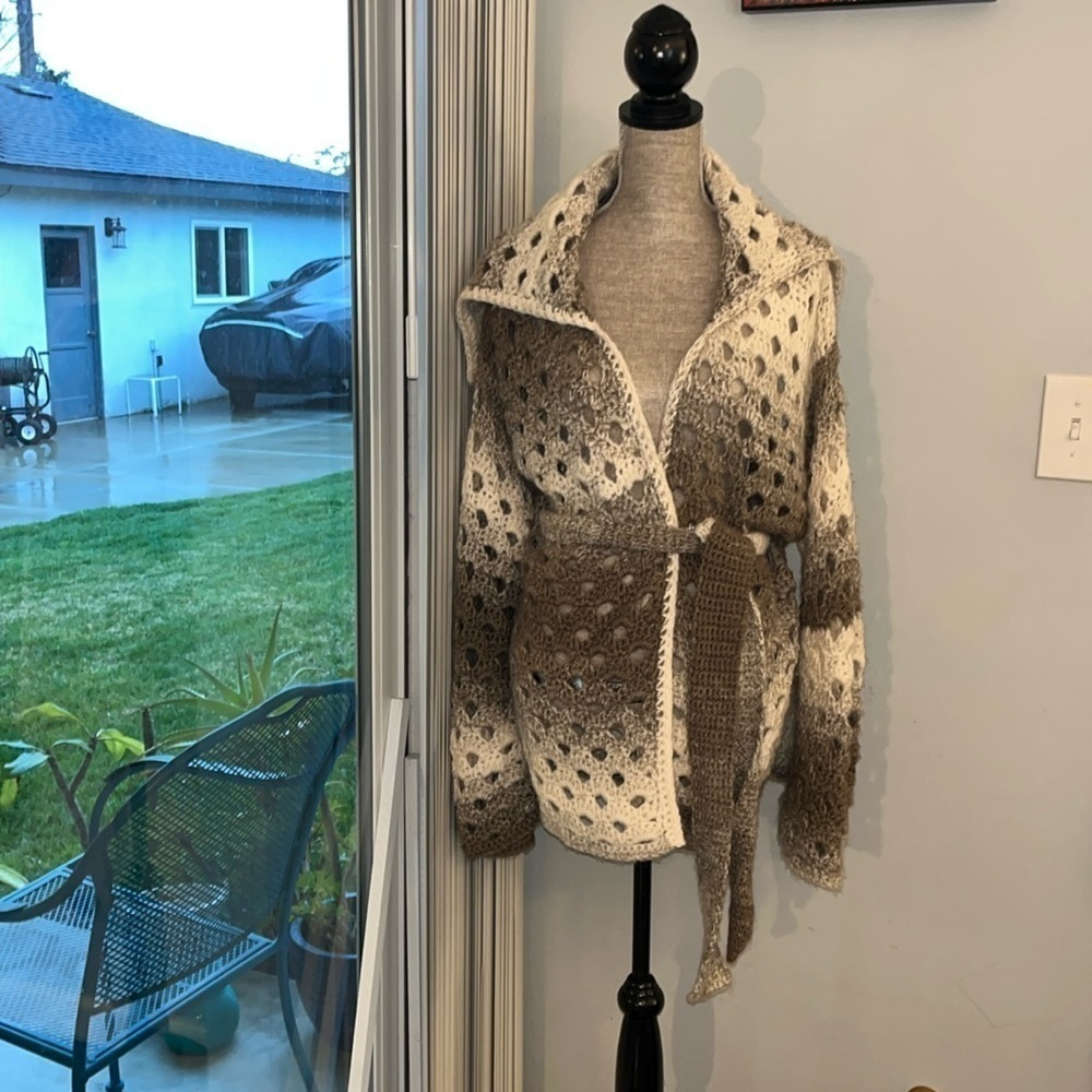 Handmade crochet cardigan w/exaggerated collar.  Light brown w/balloon sleeves